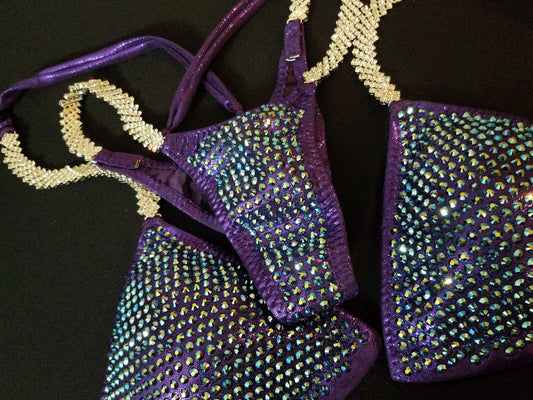 Deep Tanzinite AB crytals on a Custom Eggplant bikini